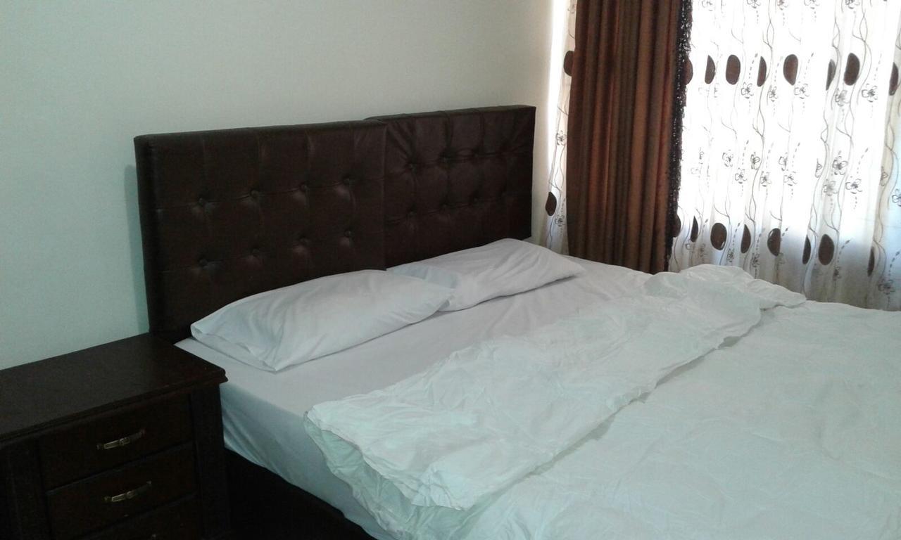 Al Tawheed Hotel Apartments Amman Bagian luar foto
