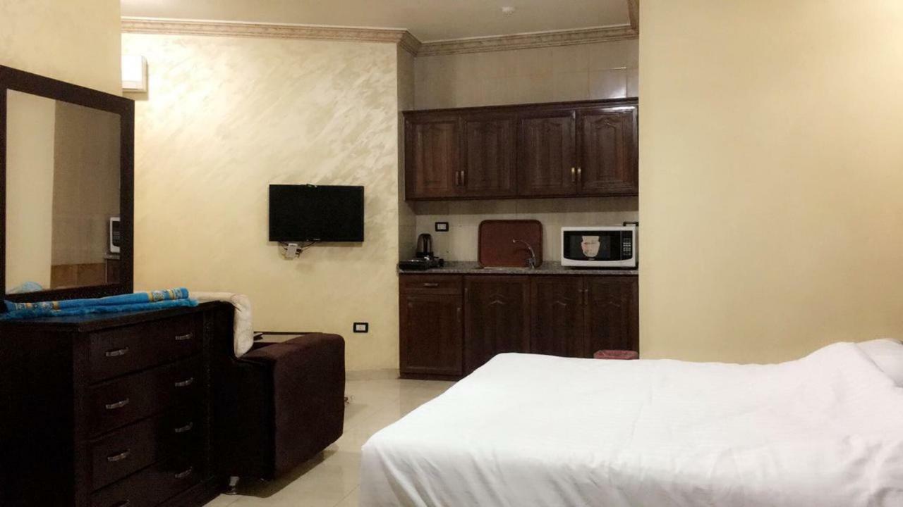Al Tawheed Hotel Apartments Amman Bagian luar foto