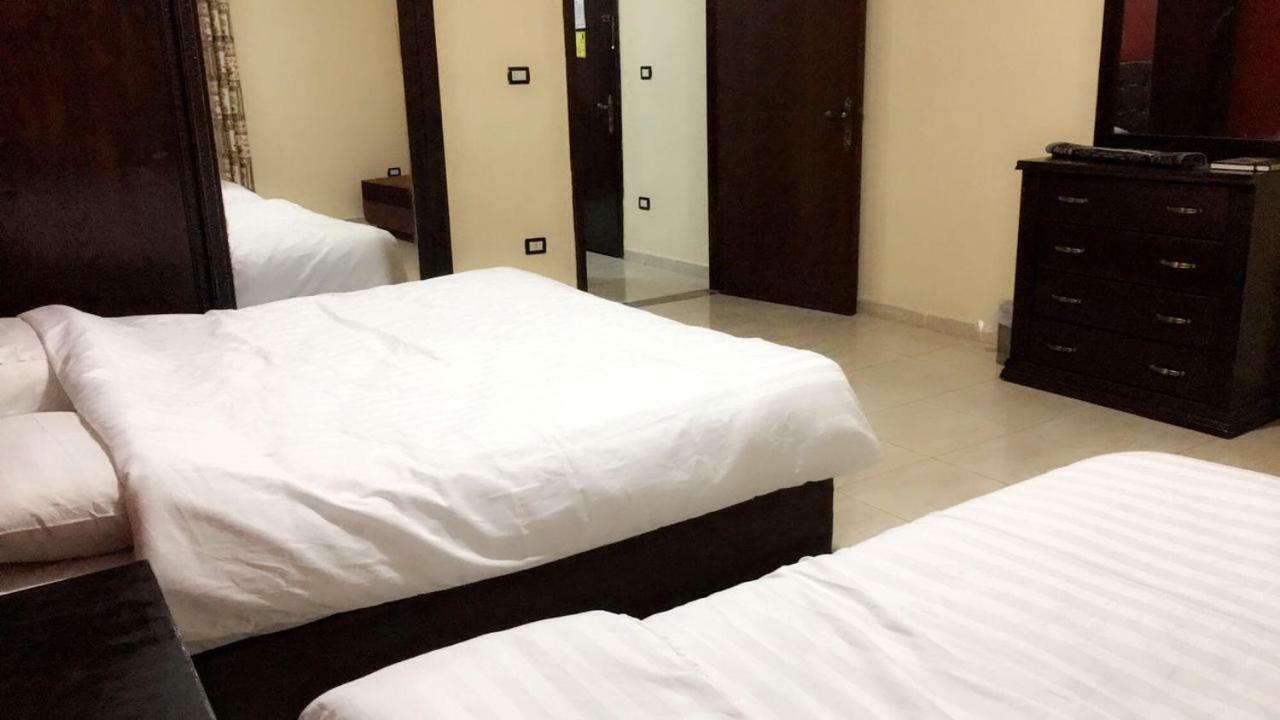 Al Tawheed Hotel Apartments Amman Bagian luar foto
